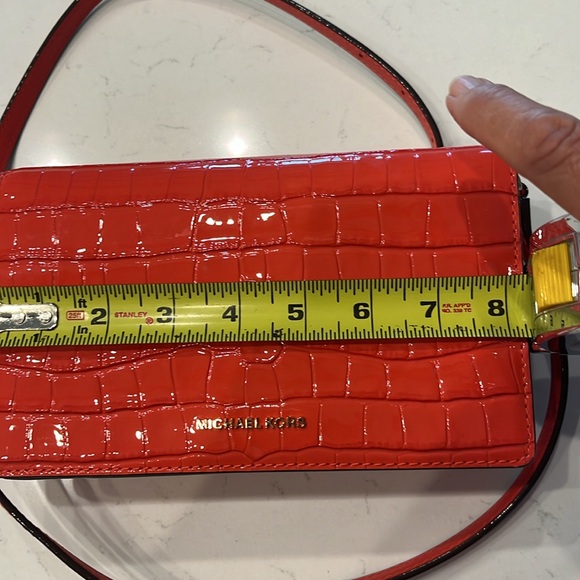 Like new Michael Kors Flap XBody bag. Used 2X - Picture 10 of 12